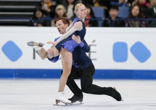 Evgenia Tarasova and Vladimir Morozov, of Russia, skate their free program at the World figure skating championships in Helsinki, Finland, on Thursday, March 30, 2017. (AP Photo/Ivan Sekretarev)